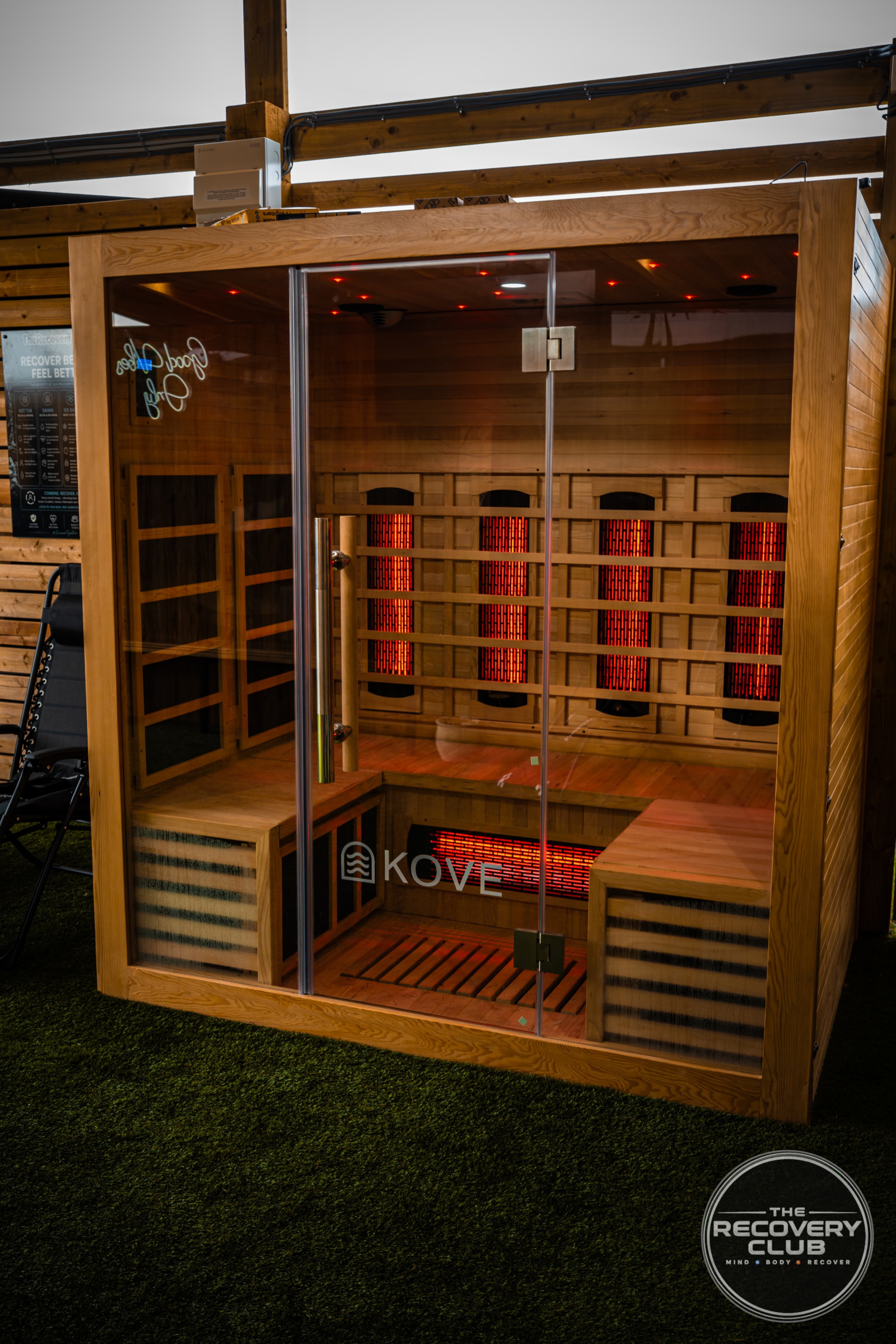 Warm lighting and wooden seating in the club’s sauna.